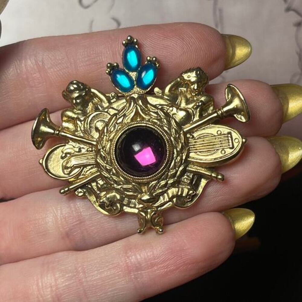 Vintage Gold Tone and Heraldic Jewel Tone Brooch with Cherubs and Trumpets